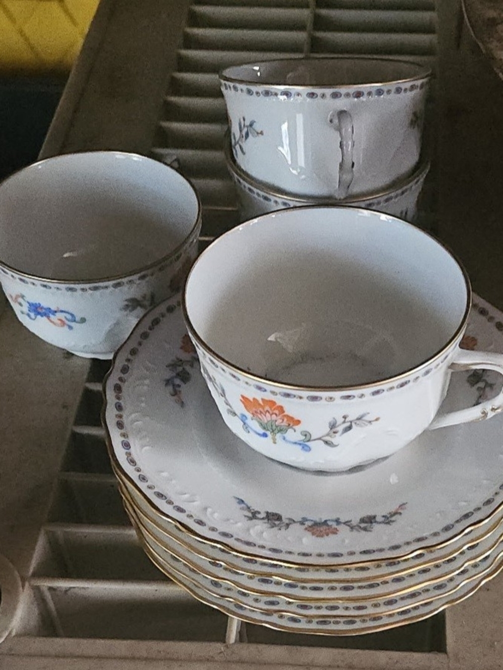 Fine Porcelain Tea Cup and Saucer Set in White with Floral Accents